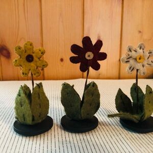 Set of 3 cute little felt flowers.
